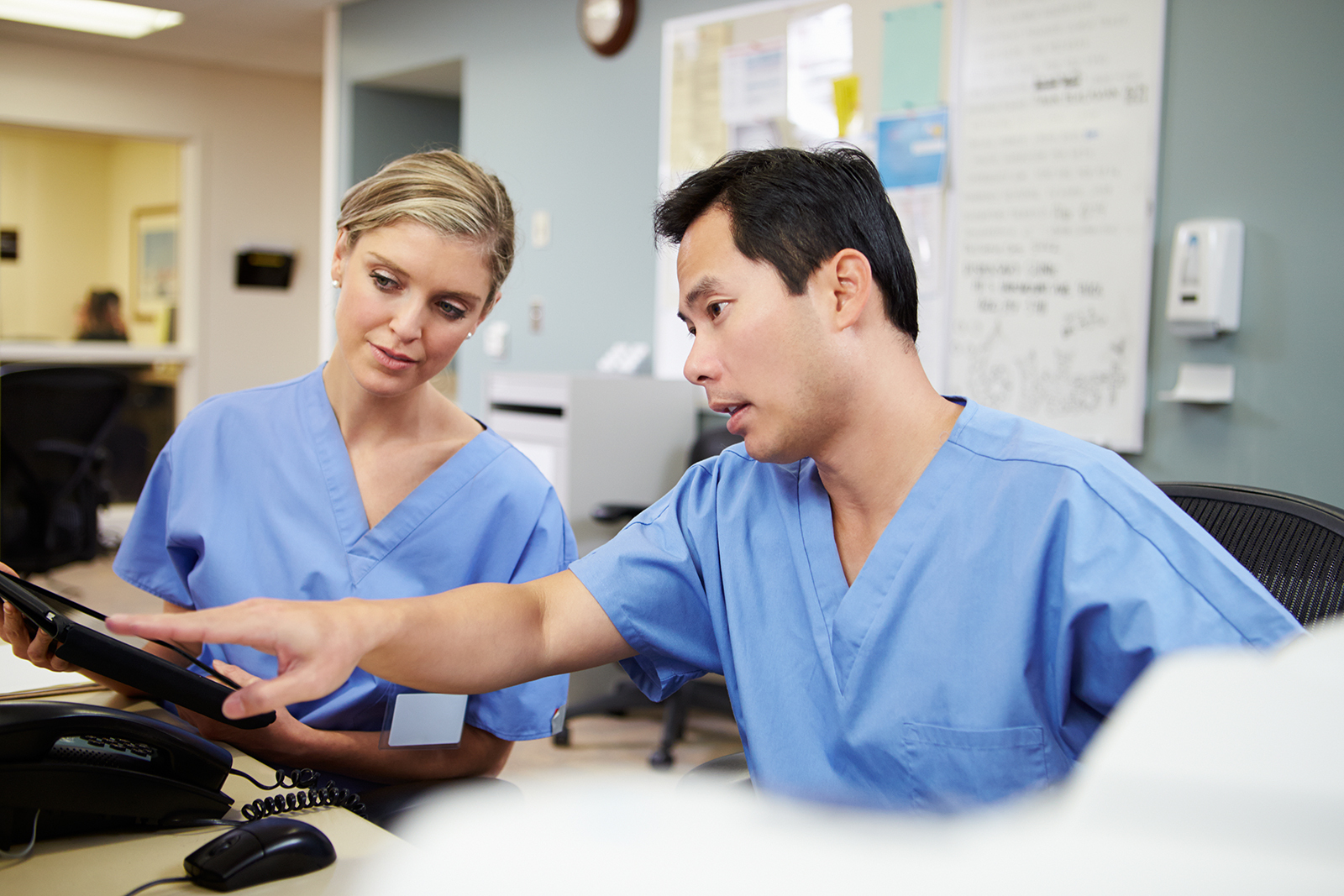 Nurses communicating with each other